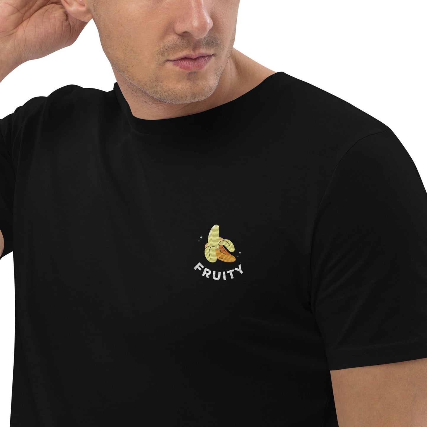 Man in black tee with banana. Fruity & queer symbolism.