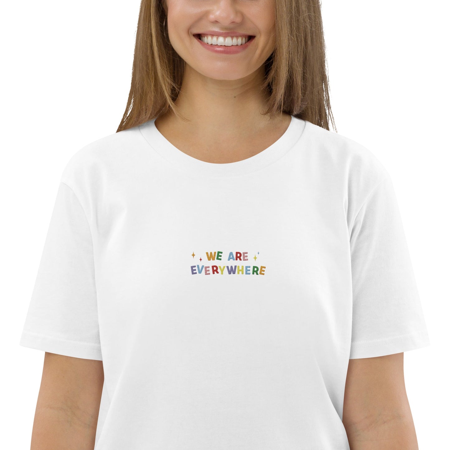 An empowering white t-shirt showcasing the statement "I am a rainbow," symbolizing inclusivity and the beauty of diversity.