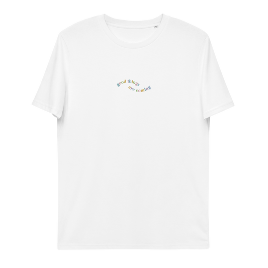 A white t-shirt with the words 'good things are coming' embroidered  on it.